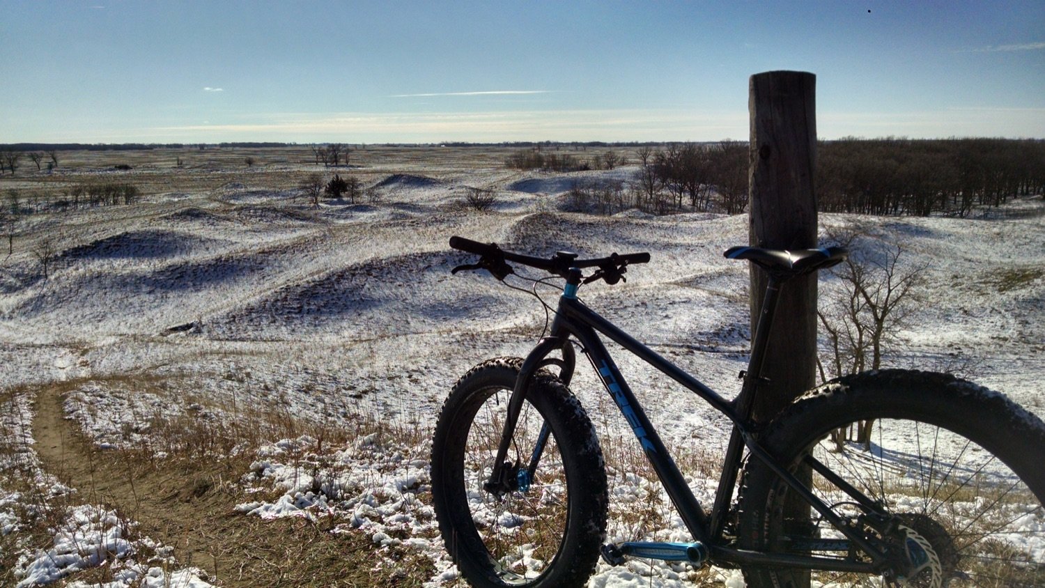 A fat-tyre bike on a snow-covered grassland in North Dakota